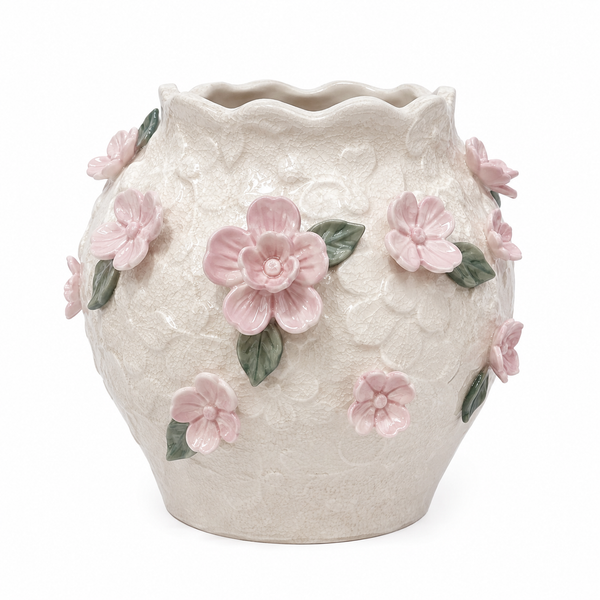A cream-colored textured ceramic planter pot decorated with 3D pink cherry blossom flowers and green leaves, shown against a plain white background.