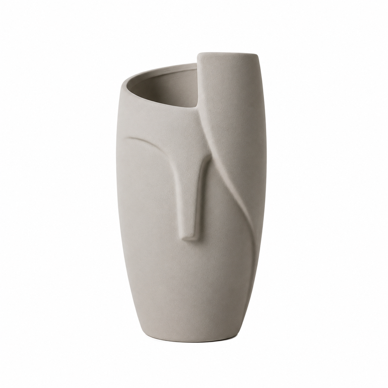 A minimalist ceramic vase in a light warm gray or greige color, featuring an abstract organic sculptural design with a curved handle and a wide, open top, set against a plain white background.