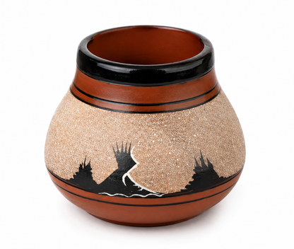 A hand-painted clay pot with a textured beige body, black decorative silhouettes, and a glossy dark brown rim, shown on a white background.