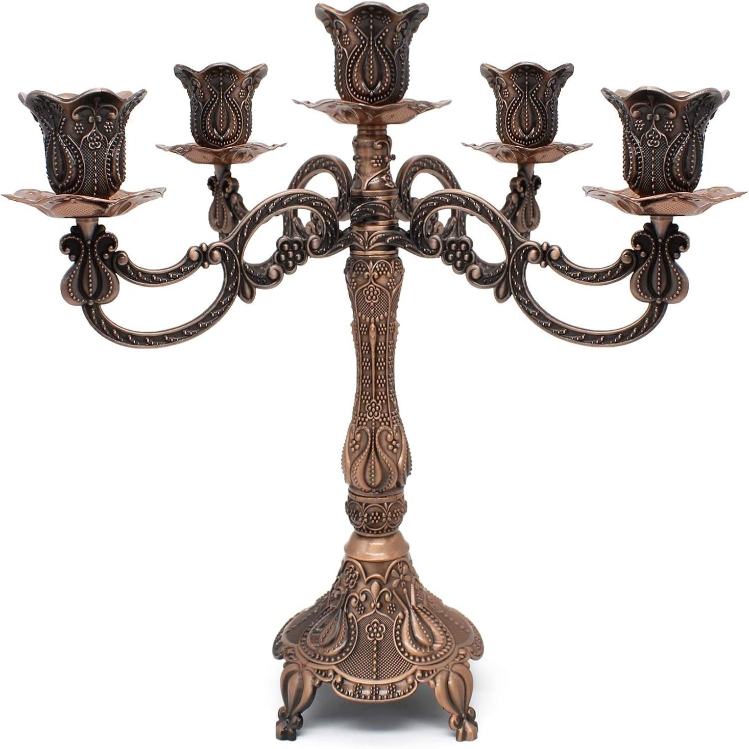 Decorative bronze candelabra on a white background