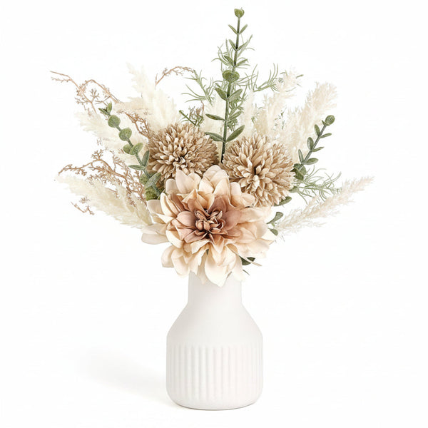 Floral arrangement in a white vase on a white background